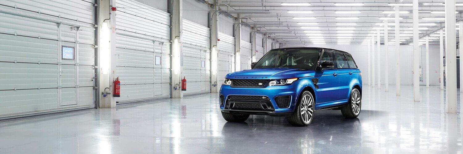 Range Rover parked inside a workshop before inspection after collection